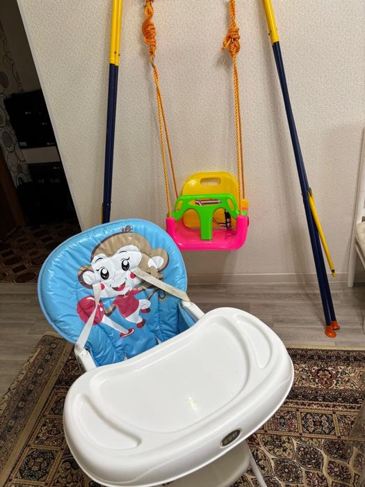 Качеля и сидушка для ребенка