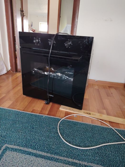 Духовой шкаф. Духовка Midea