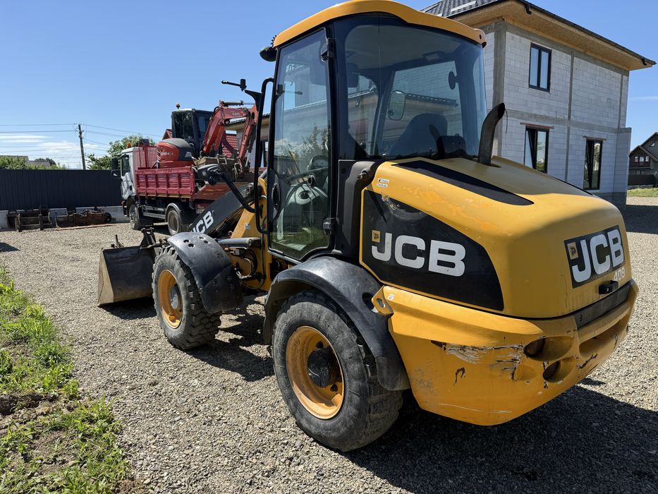Jcb 409 vola incarcator frontal  furci cupa volvo