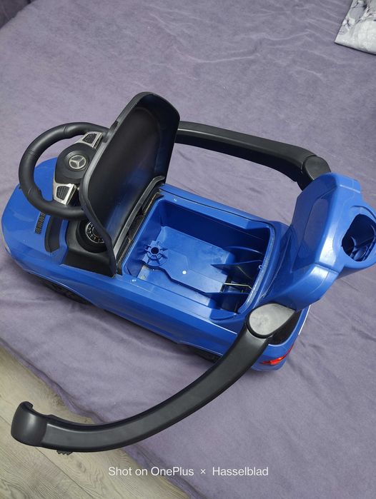 Машинка для катания детей.