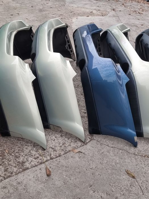 Задний бампер на Subaru Outback BP  2007 год .