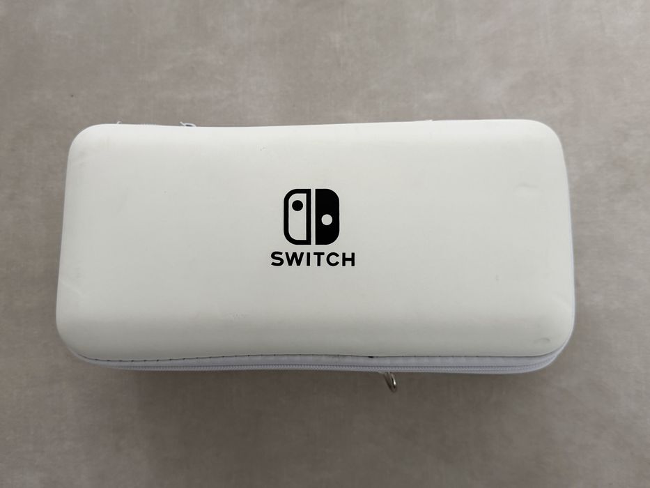 Nintendo Switch OLED White – Husă + 2 jocuri | Gata de utilizare