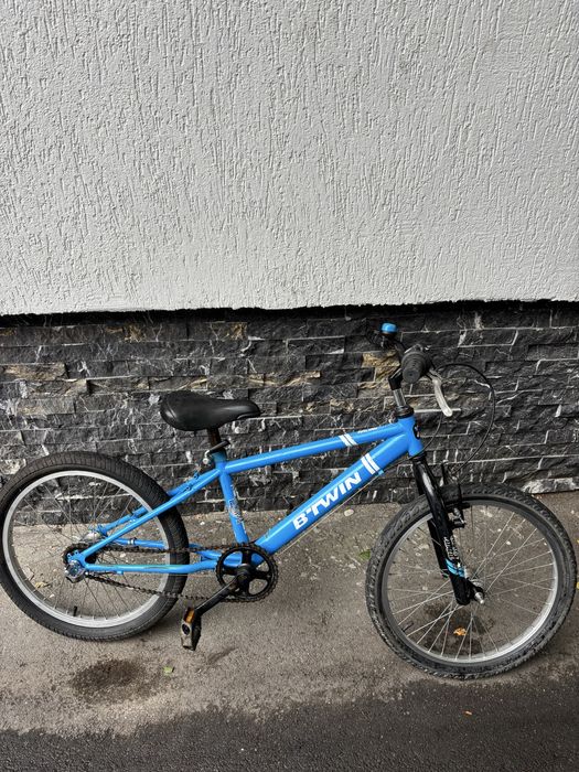 Bicicletă copii B’TWIN Racing Boy 20” – stare bună