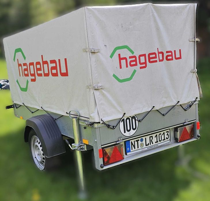 Remorcă STEMA 750 kg – prelată înaltă originală + prelată Tarpofix nouă
