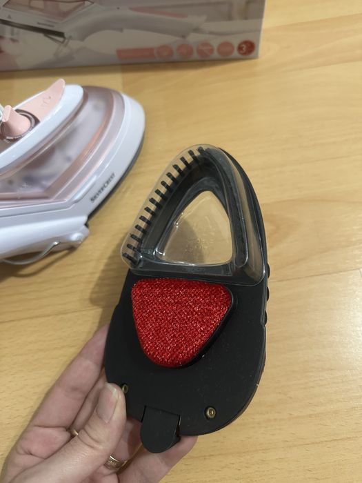 Fier de calcat vertical cu aburi