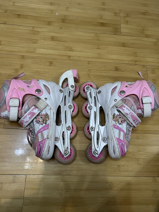 ролики б/у, розовые