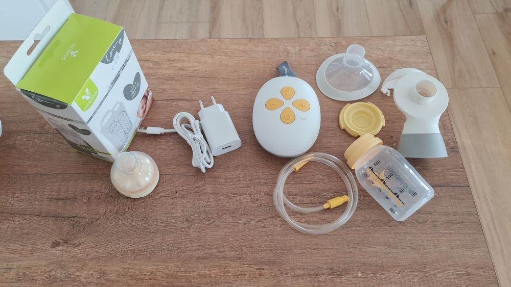 Електрическа помпа за кърма Medela + биберон Калма + пликове за кърма