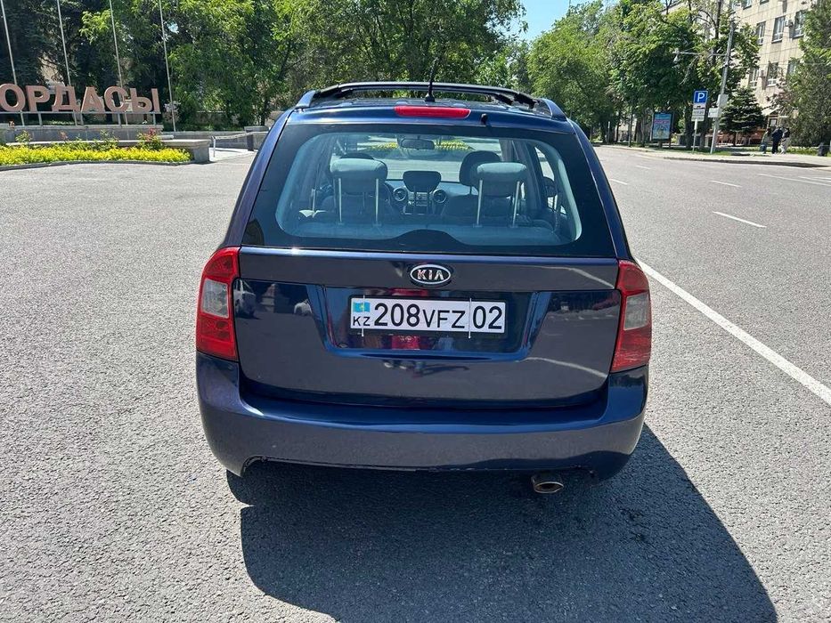 Kia Carans Минивэн