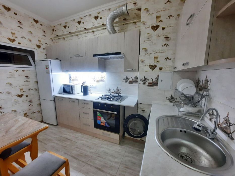 Метро Ойбек ул.Чехова 3/6/8 ориентир кафе "Bon" и "B&B"