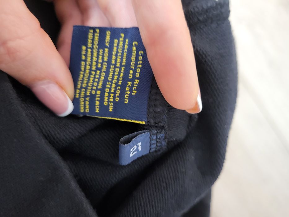 Тениска Ralph Lauren, къси панталони Polo, горнище Nike, кори за футбо