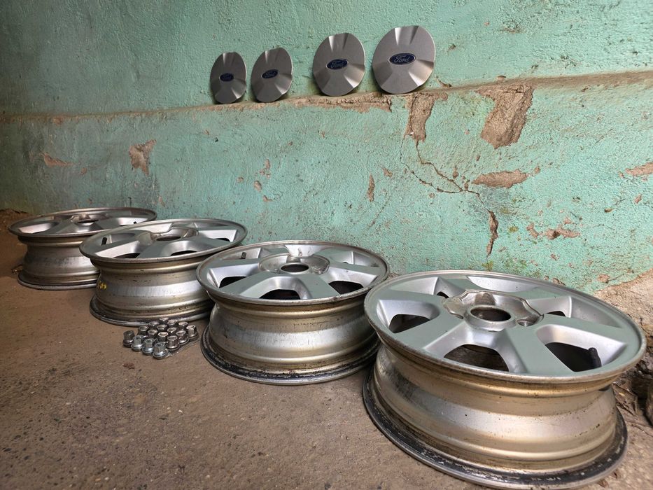Set 4 jante aliaj 14'' Ford 5Jx14 H2 ET36 + 4 capace + 16 piulite