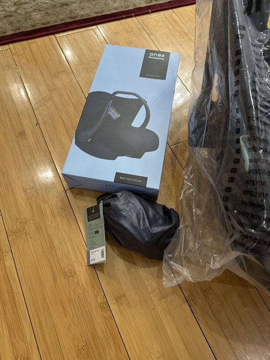 Anex автокресло автолюлька