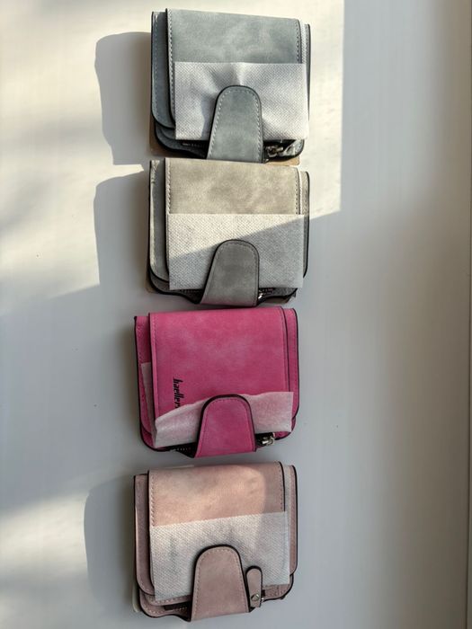 Продам кошельки Baellerry новые.