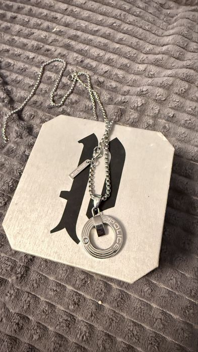 Vând set bijuterii bărbați marca POLICE – brățară + lanț cu pandantiv