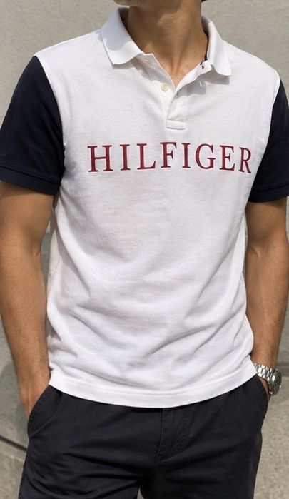 Tommy Hilfiger Polo alb cu mâneci bleumarin  se poate livrare prin olx sau predare personala in craiova