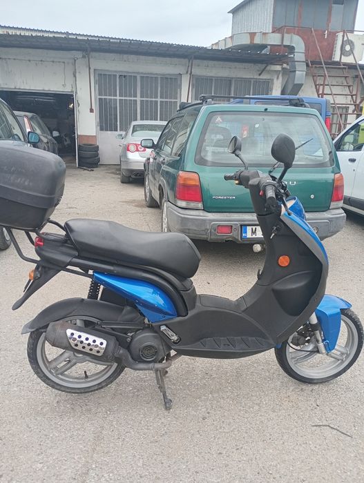Peugeot скутер ..