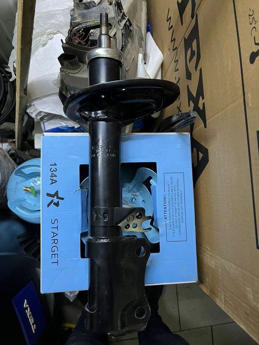 Стойка амортизатора