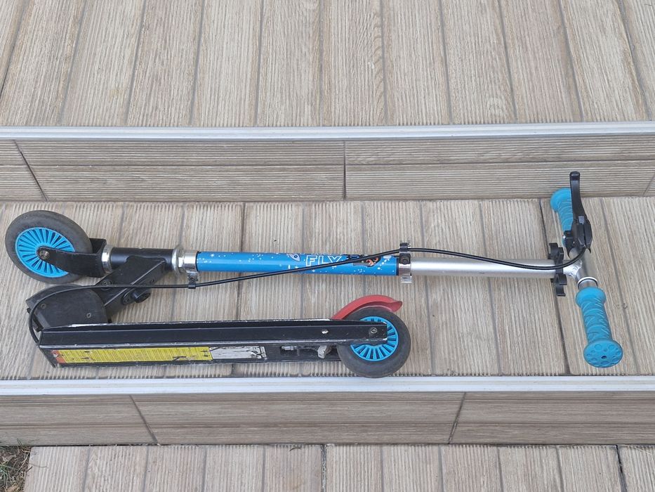 Trotineta Firefly A 120 - Intersport- pliabila cu frana pe ghidon