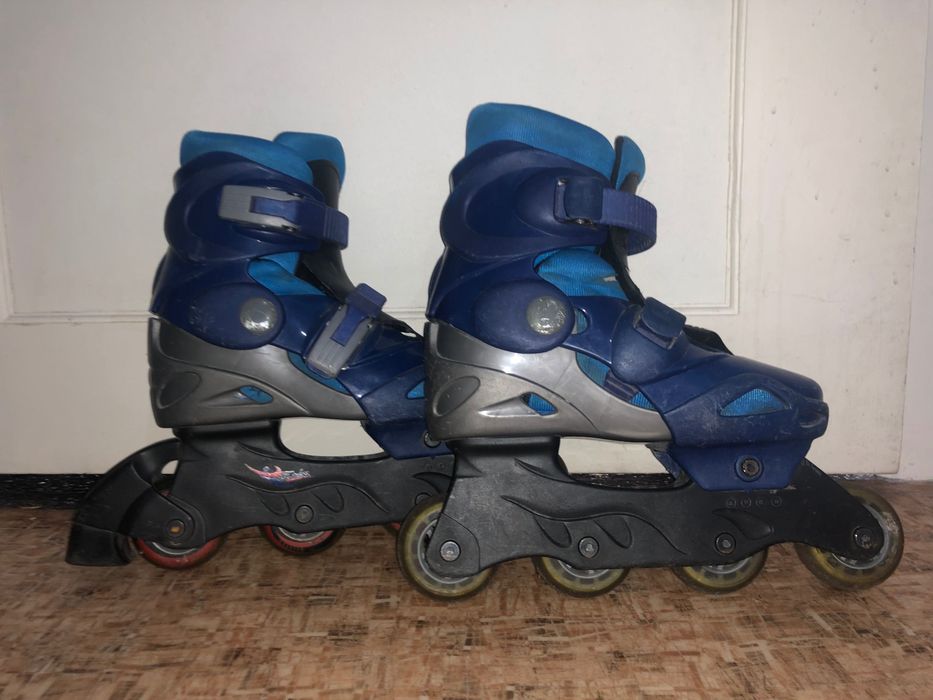 Роликовые коньки