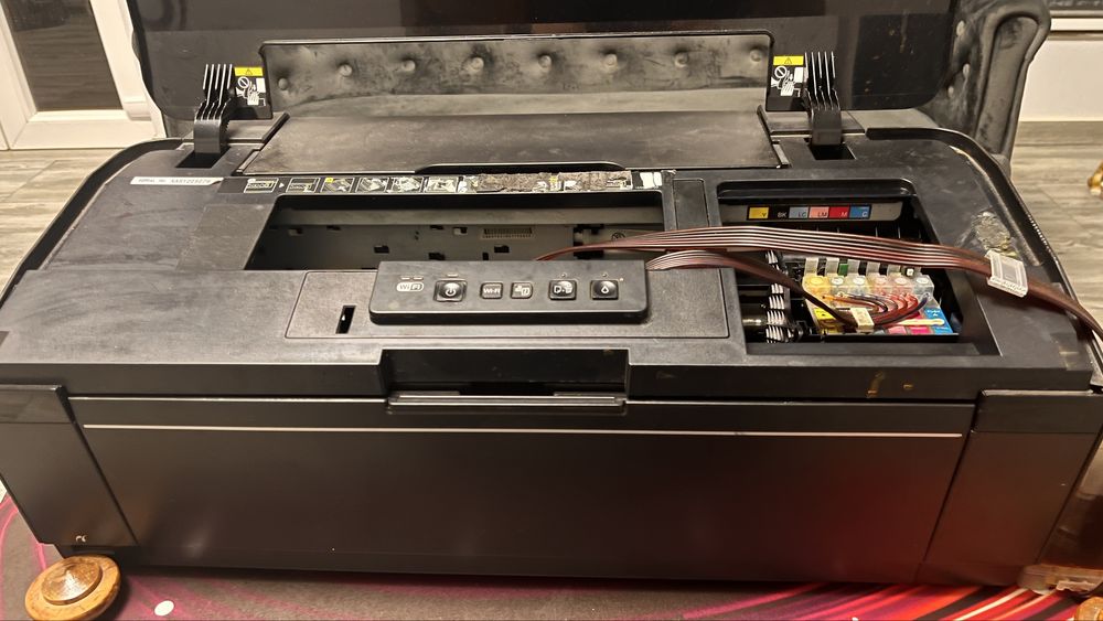 Imprimanta Epson 1500w functionala necesita curatare cap printare