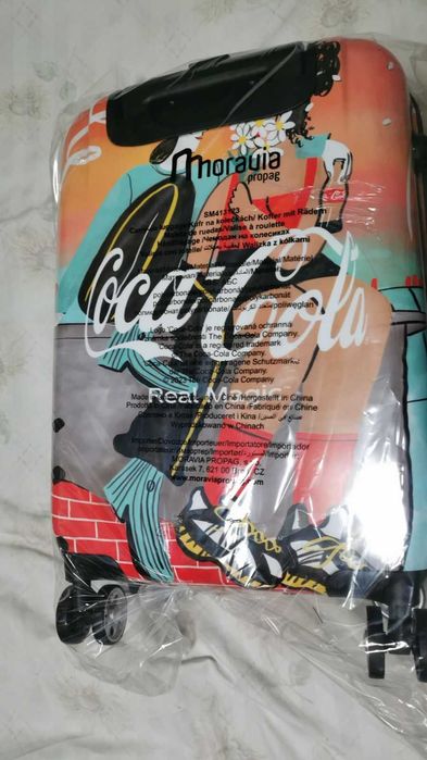 Раница,термус,сутчър,чорапи,колонка и други на Кока-кола и нутела