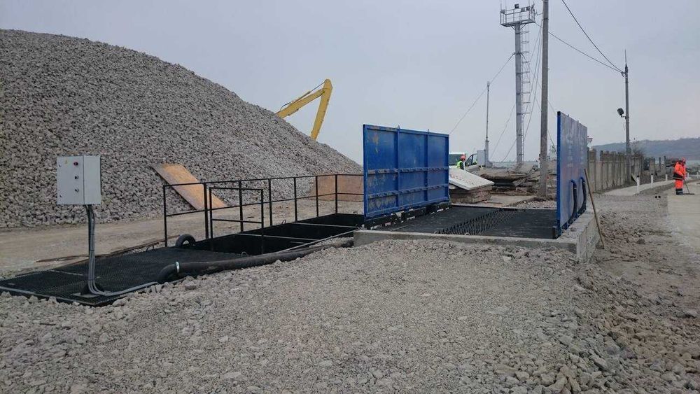 Платформа для мойки колёс на стройплощадках.