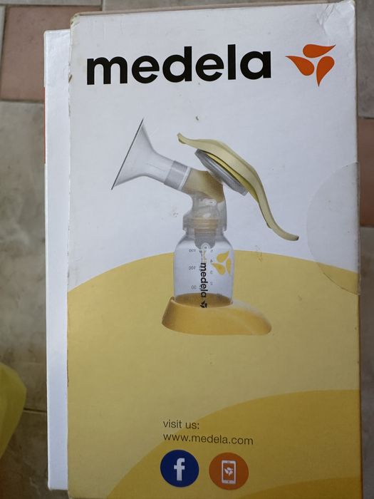 Молокоотсос Medela