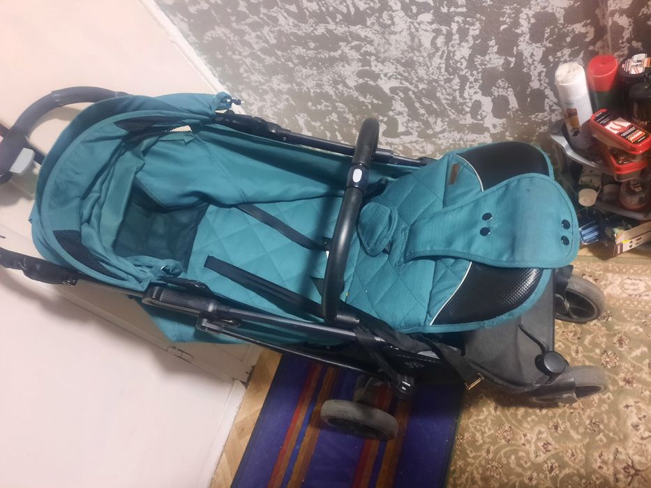 Продам коляску бирюза