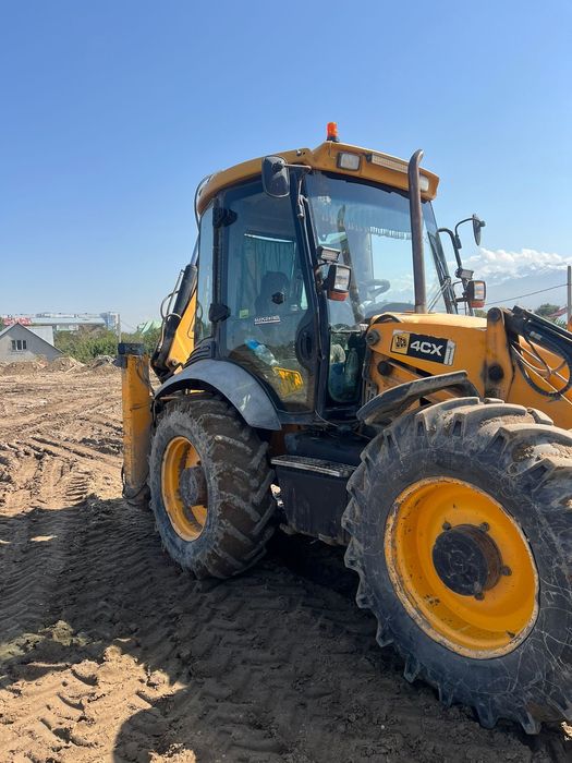 Экскаватрр- Погрузчик JCB 4CX SM