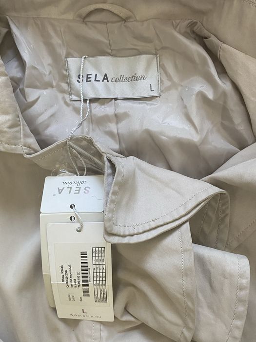 Тренч от компании Sela