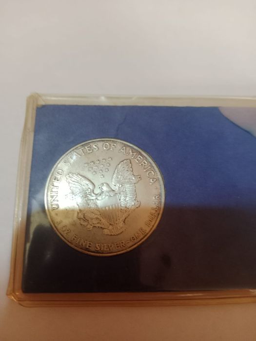Монета доллар серебро