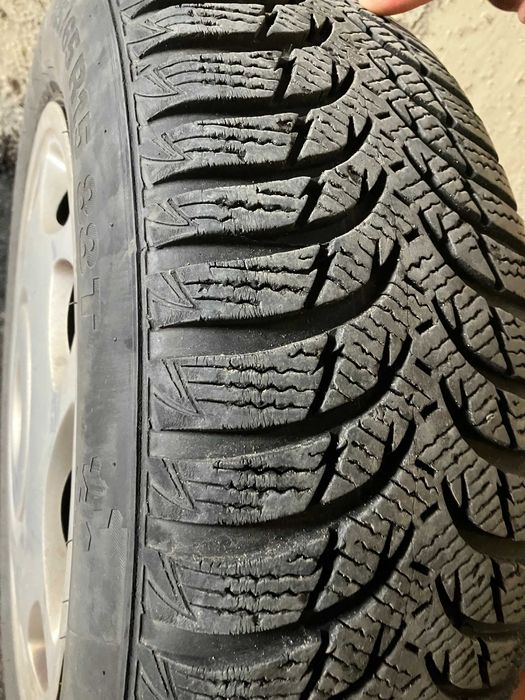 зимни гуми KUMHO 185/65/ 15 4 броя ,с железни джанти и тасове БМВ