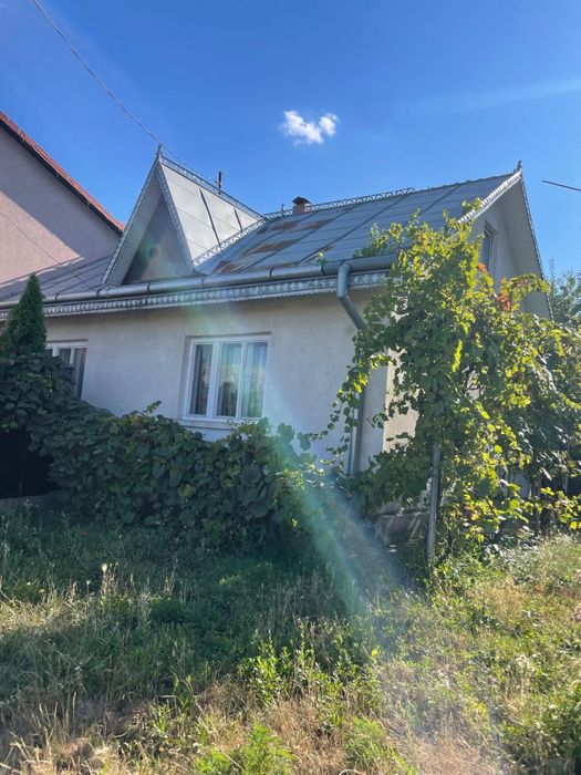 casa + curte de vanzare