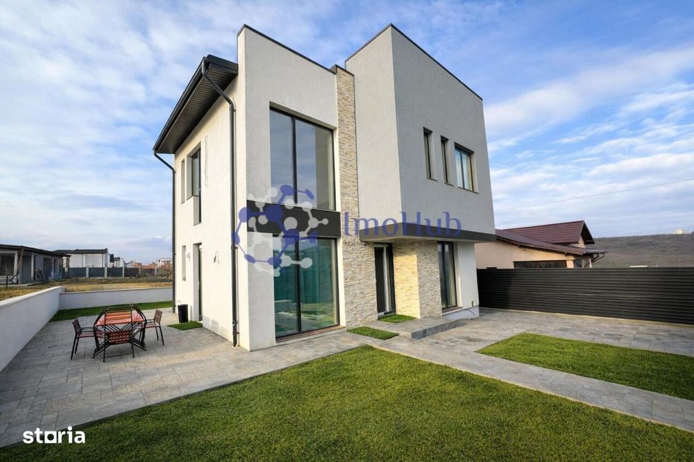 Casă de vânzare cu 3 dormitoare+birou, teren de joaca 200mp Rediu,