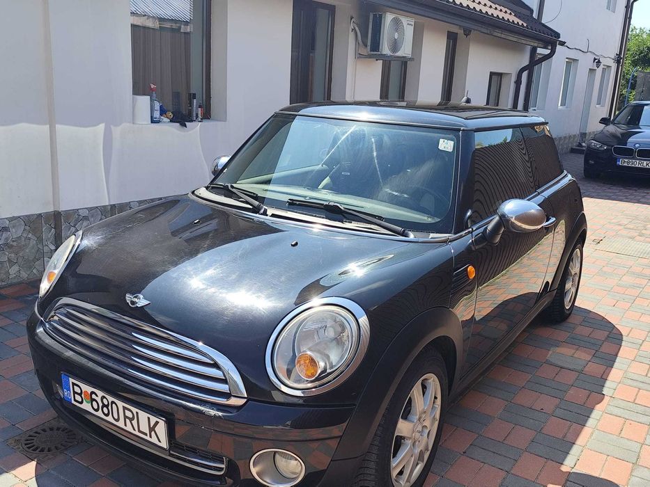 Vand MINI One (2009)  1.4 Benzină  97.800 km  Navigație