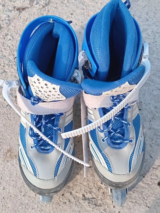 Роликовые коньки