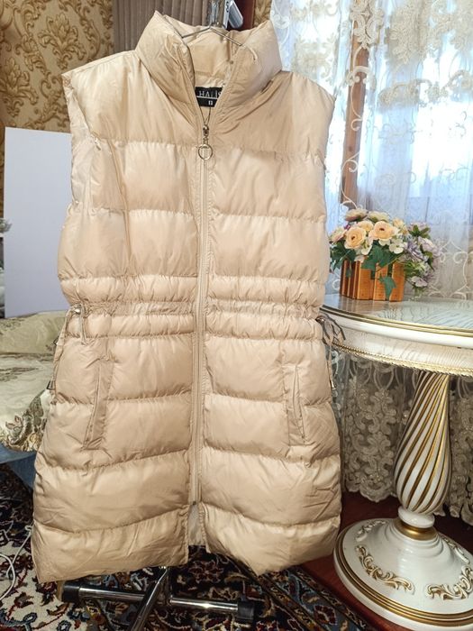 Новая дутая жилетка.
