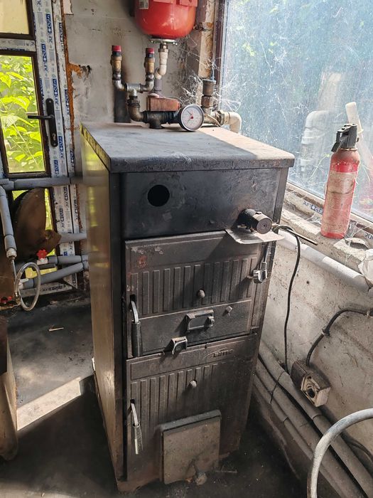 Centrala termica  pe combustibil solid de 25kw