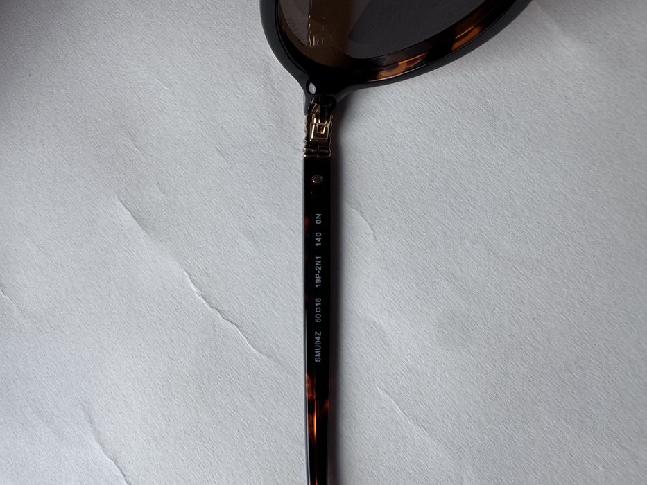 Ochelari de soare Miu Miu Oval SMU04Z 50-18 140, Noi