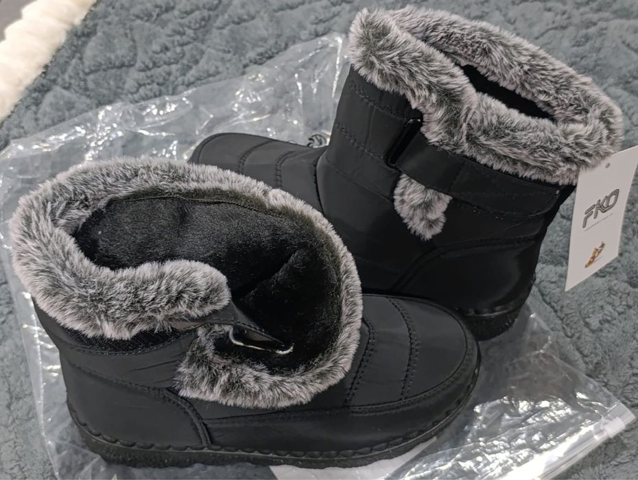 Продам новые сапоги