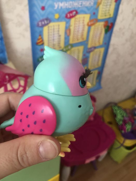 Продам игрушку птичка в клетке