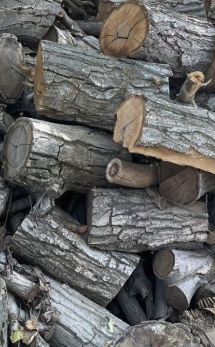 Дрова колотые в мешках