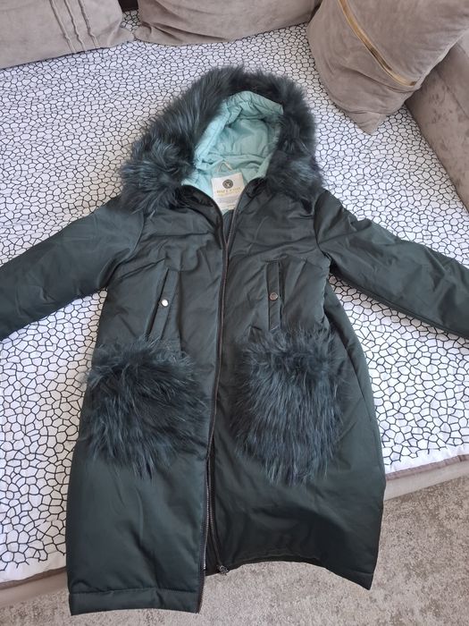 Продаётся женский пуховик
