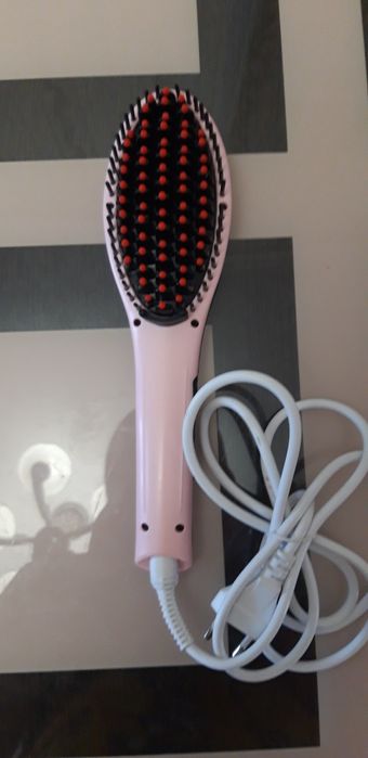 Продам Расческу - выпрямитель для волос.