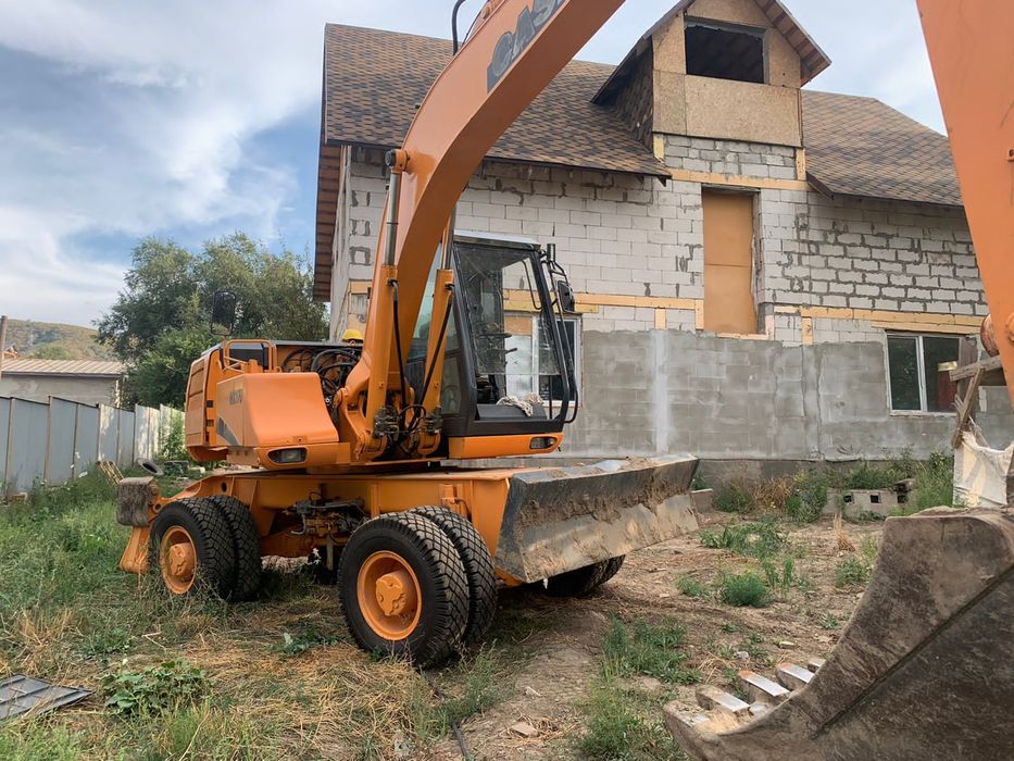 Экскаватор колёсный