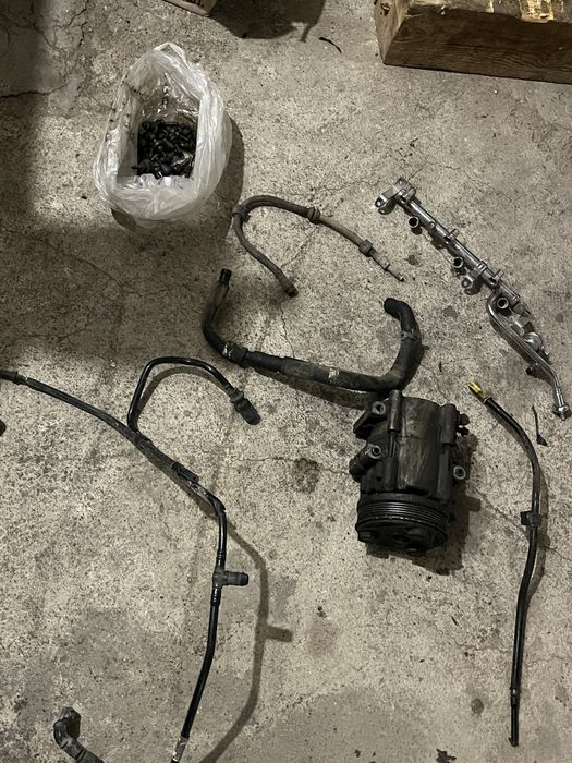 Запчасти на Мазда Трибут