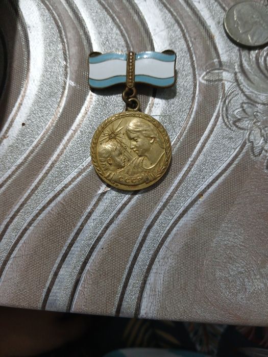 Медаль мать героиня