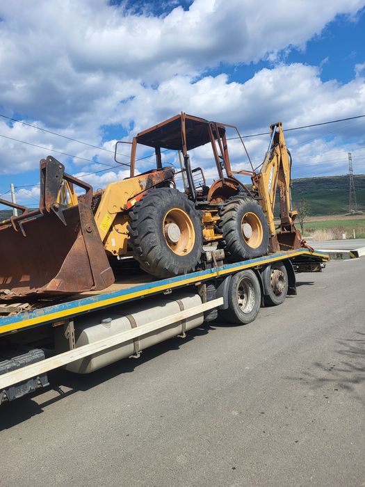 Dezmembrez buldoexcavator case fermec terex 595 695
