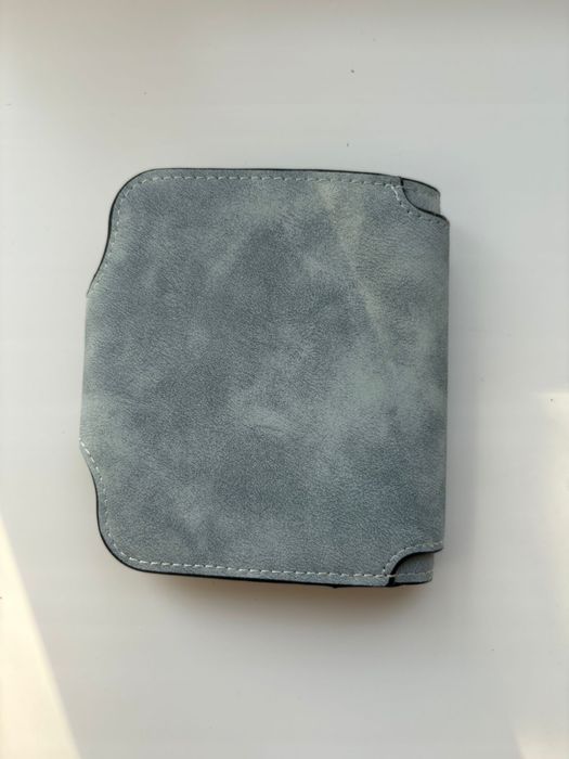 Продам кошельки Baellerry новые.