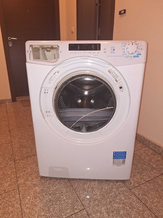 Пералня Candy CS1382D3/2S на части.